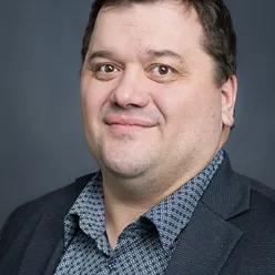 A man smiling for the camera