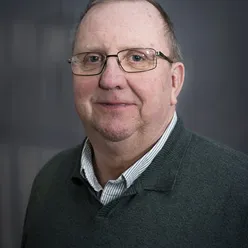 A man wearing glasses