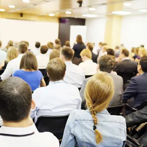 Illustrasjonsbilde av publikum i en konferansesal