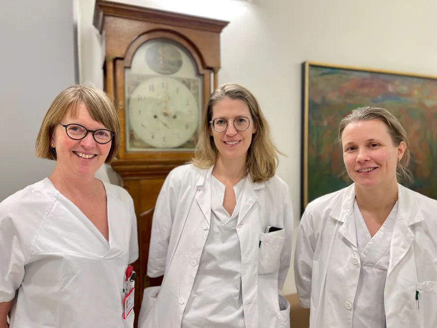 En gruppe kvinner i laboratoriefrakker