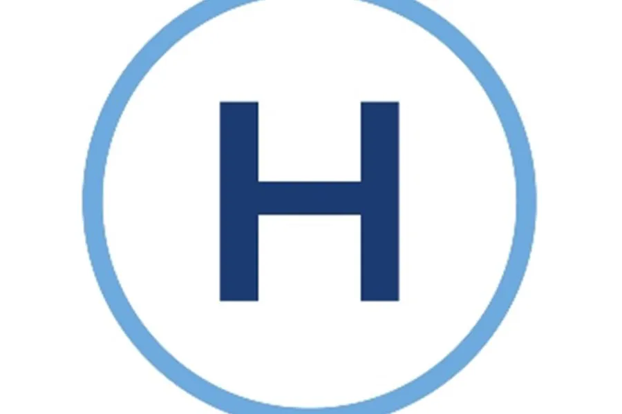 En blå sirkel med en hvit sirkel i midten